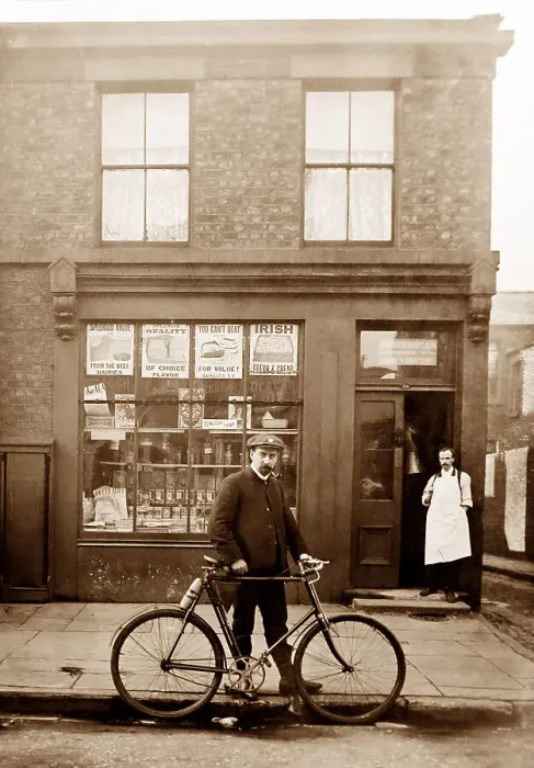 Framed Print : Grocery shop and cyclist in Rawtenstall, early 1900s Framed Print : Grocery shop and cyclist in Rawtenstall, early 1900s