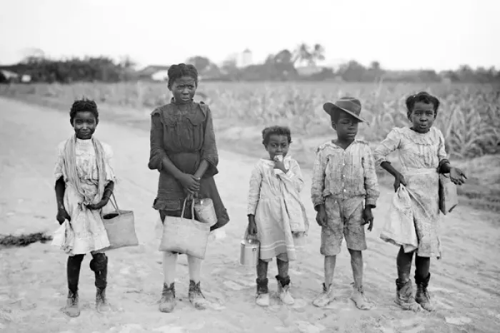 Framed Print : A group of African-American children on a country road in Am Framed Print : A group of African-American children on a country road in Am
