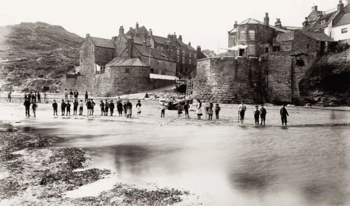 Framed Print : Group on the beach at Robin Hoods Bay, Yorkshire, England Framed Print : Group on the beach at Robin Hoods Bay, Yorkshire, England