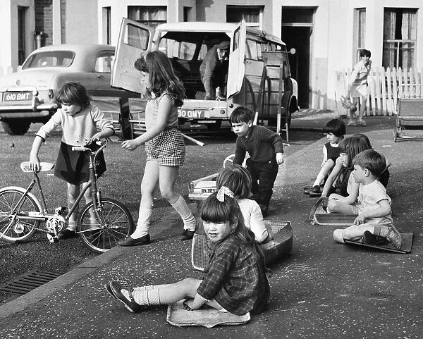 Group of children playing on a Balham street, SW London
