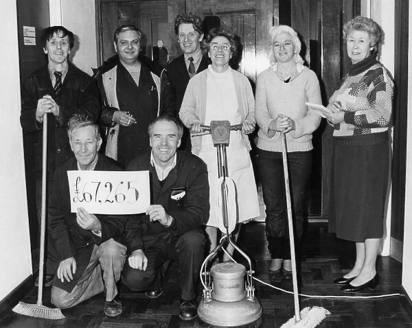 Group of cleaners who won the football pools