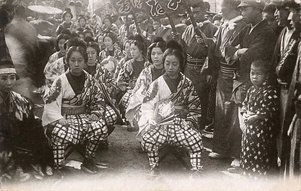 A Group of Japanese women in matching costume at a Festival