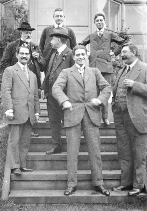 Framed Print : Group of men on steps of house Framed Print : Group of men on steps of house