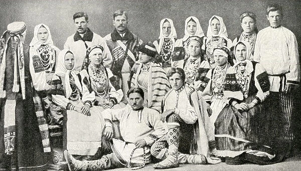 Group of men and women in traditional dress, Estonia