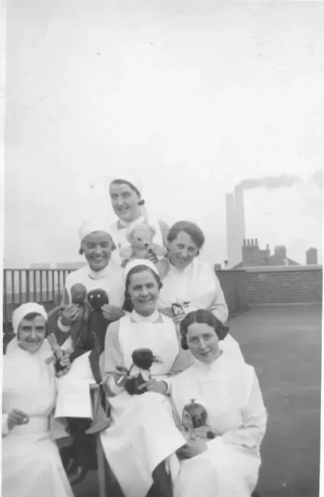 Framed Print : Group of nurses with toys Framed Print : Group of nurses with toys