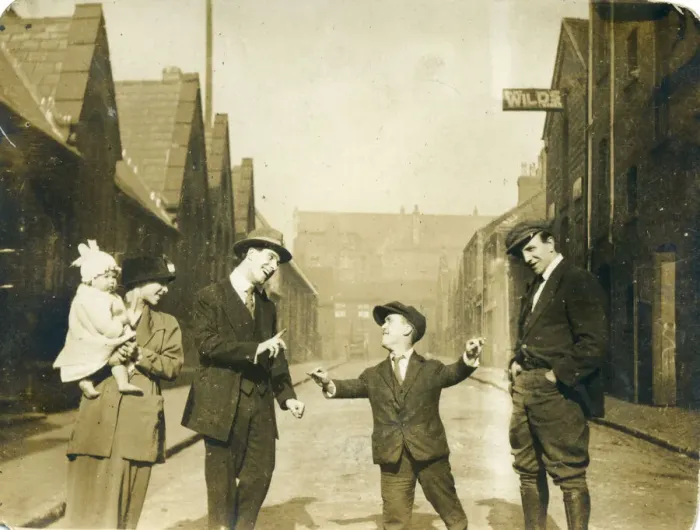 Framed Print : Group of people, possibly family members, including a man of restricted growth (dwarfism) Framed Print : Group of people, possibly family members, including a man of restricted growth (dwarfism)