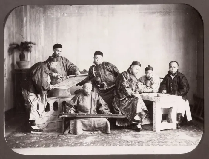 Framed Print : Group of seated Chinese men, musician, China Framed Print : Group of seated Chinese men, musician, China