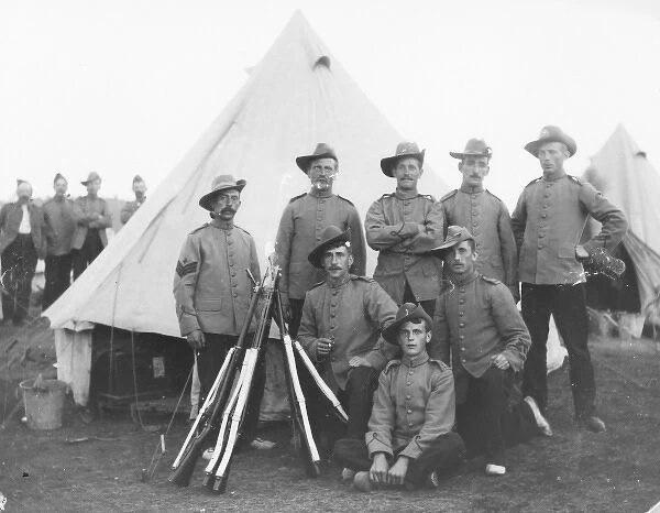Group of eight soldiers at a training camp