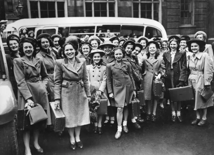 Framed Print : Group of women in front of a coach Framed Print : Group of women in front of a coach