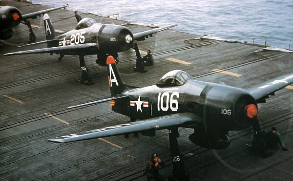 Grumman F8F-1 Bearcat trio (forward view) ready to laun