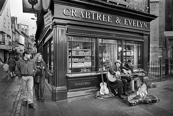 Guitarists busking in the street, York, England
