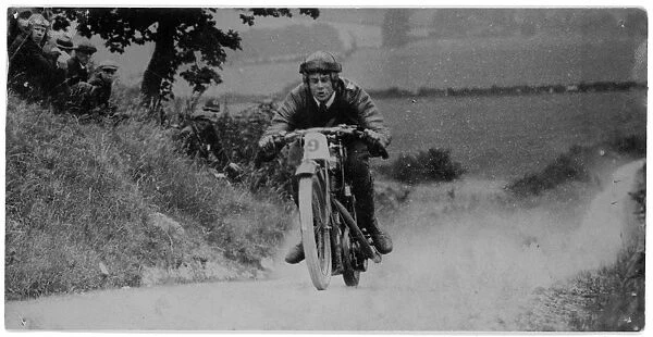 H. O. Tomblin on his racing motorcycle
