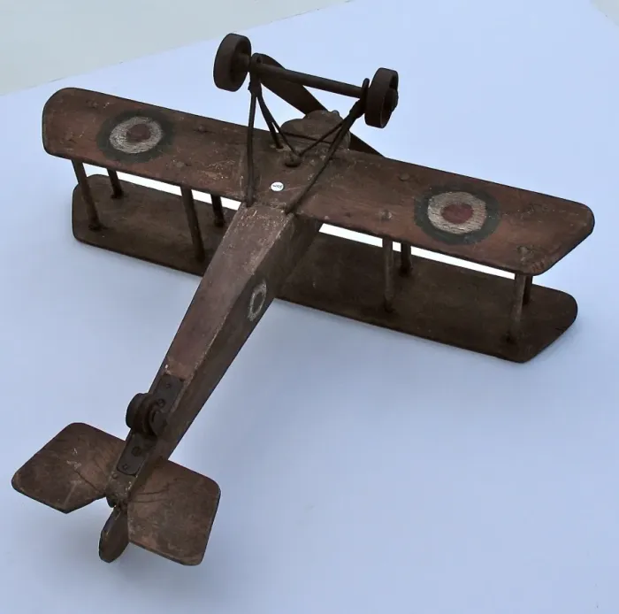 Framed Print : A hand-made wooden model of a WWI biplane Framed Print : A hand-made wooden model of a WWI biplane