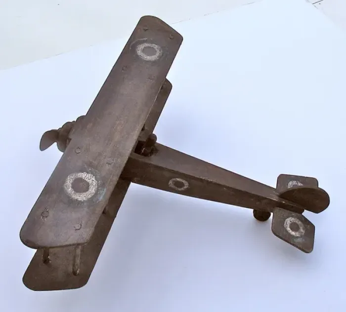 Framed Print : A hand-made wooden model of a WWI biplane Framed Print : A hand-made wooden model of a WWI biplane