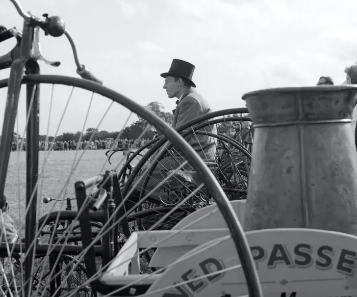 Framed Print : Top Hat. Man wearing a top hat Penny Farthing in the foreground at Country Framed Print : Top Hat. Man wearing a top hat Penny Farthing in the foreground at Country