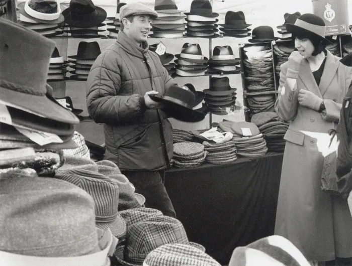 Framed Print : Hat seller at a market, Suffolk, England Framed Print : Hat seller at a market, Suffolk, England