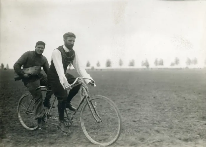 Framed Print : Henry Farman, 1874-1958, on the front of a tandem bicycle Framed Print : Henry Farman, 1874-1958, on the front of a tandem bicycle