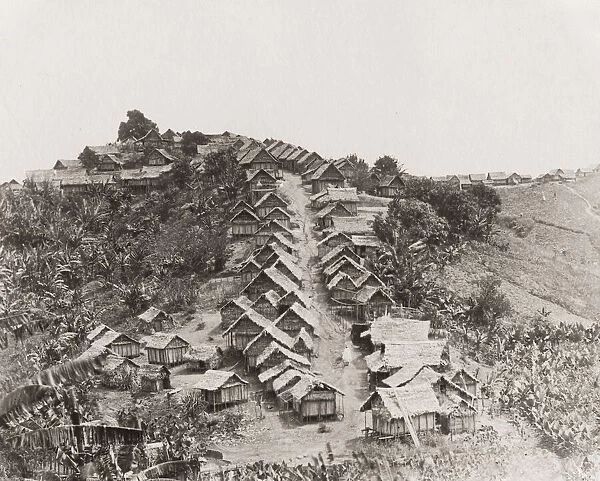 Hill town with uniform thatched huts, Madagascar