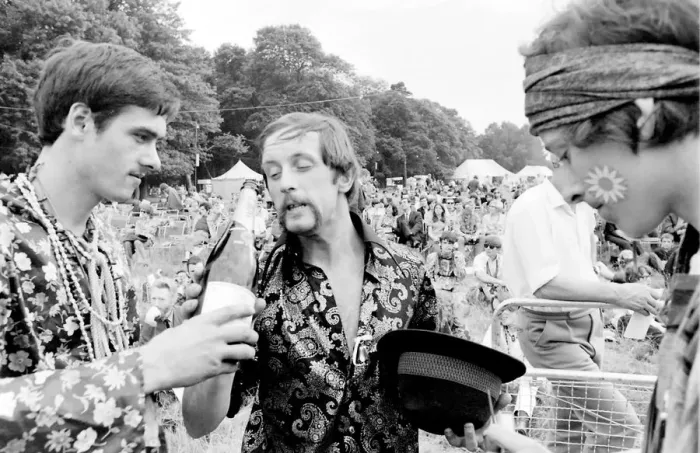 Framed Print : Hippy men with champagne at Woburn Park Framed Print : Hippy men with champagne at Woburn Park