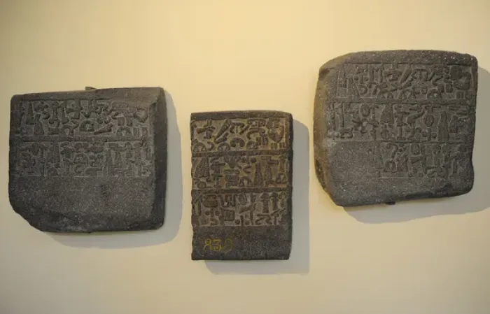 Framed Print : Hitite slabs with hieroglyphic inscription about the activit Framed Print : Hitite slabs with hieroglyphic inscription about the activit