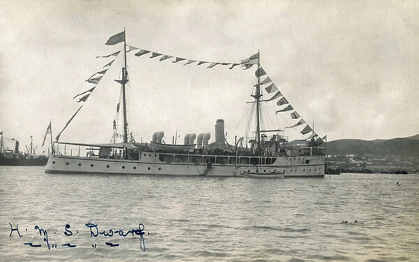 HMS Dwarf at sea with flags flying
