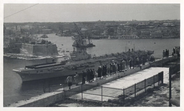 HMS Ocean, aircraft carrier leaving Malta Docks Date: C. 1950s
