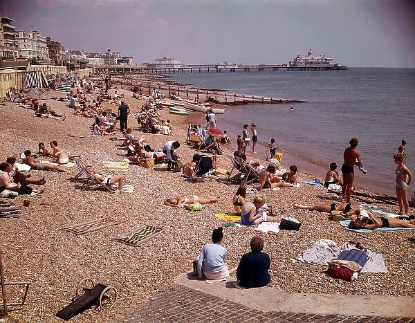 Holidaymakers on the beach, Torquay, Devon