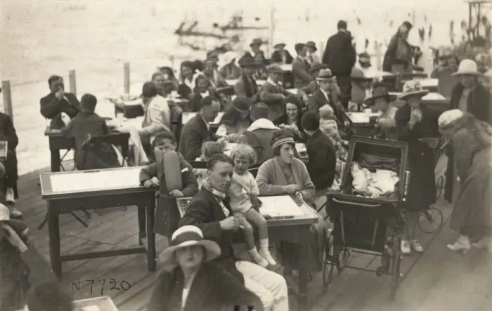 Framed Print : Holidaymakers on a British Pier - seated at tables Framed Print : Holidaymakers on a British Pier - seated at tables
