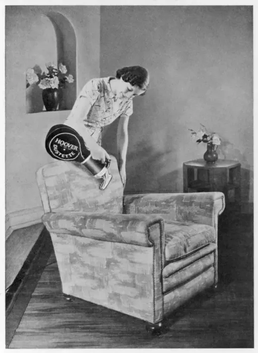 Framed Print : Hoovering a Chair 1930S Framed Print : Hoovering a Chair 1930S
