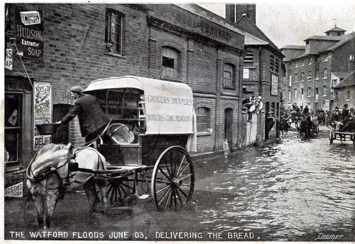 Framed Print : Horse and cart making deliveries in a flooded street Framed Print : Horse and cart making deliveries in a flooded street