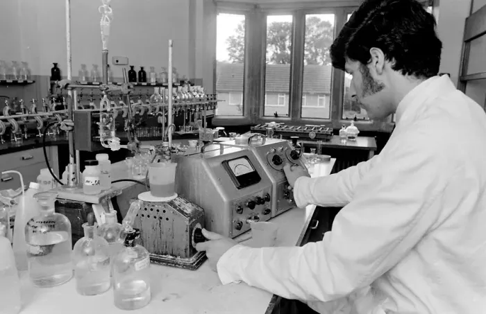 Framed Print : Horse doping tests -- a laboratory technician in a white coat turns a knob on a machine Framed Print : Horse doping tests -- a laboratory technician in a white coat turns a knob on a machine