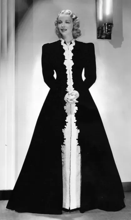 Framed Print : A hostess gown of black velvet, designed by Dolly Tree Framed Print : A hostess gown of black velvet, designed by Dolly Tree