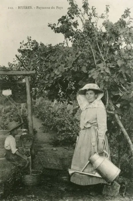 Framed Print : Hyeres, France - Countrywoman with watering can Framed Print : Hyeres, France - Countrywoman with watering can
