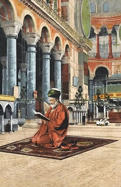 Imam at prayer inside the Ayasofya
