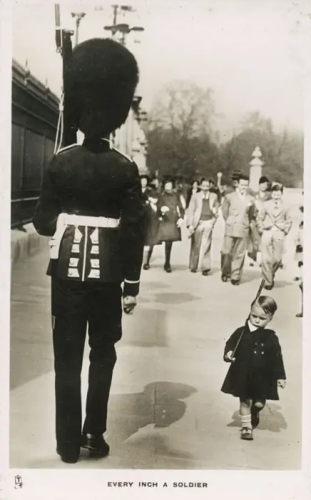 Framed Print : Every Inch a Soldier - A youn boy marches past a Guardsman in proud imitation Framed Print : Every Inch a Soldier - A youn boy marches past a Guardsman in proud imitation