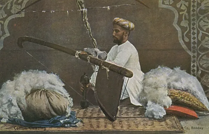 Framed Print : Indian man cleaning cotton Framed Print : Indian man cleaning cotton
