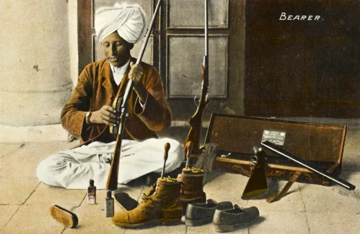 Framed Print : Indian servant cleaning his Masters equipment Framed Print : Indian servant cleaning his Masters equipment