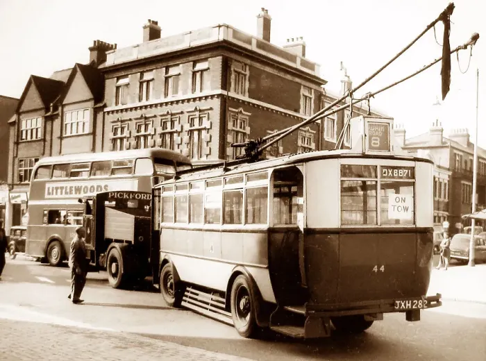 Framed Print : Ipswich trolley bus and Pickfords tow truck, possibly 1950s Framed Print : Ipswich trolley bus and Pickfords tow truck, possibly 1950s