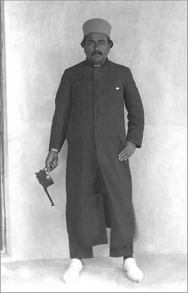 Iranian Gentleman holding a Mauser