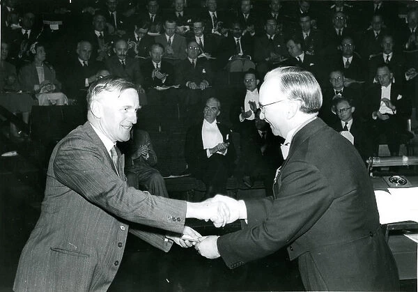 J. W. Barnes, left, is presented with his Royal Aeronauti?