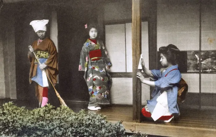 Framed Print : Japan - Geisha Girl - posing at home with two house staff Framed Print : Japan - Geisha Girl - posing at home with two house staff