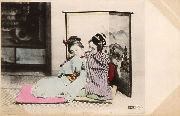 Japan - Two Geisha Girls whispering to each other
