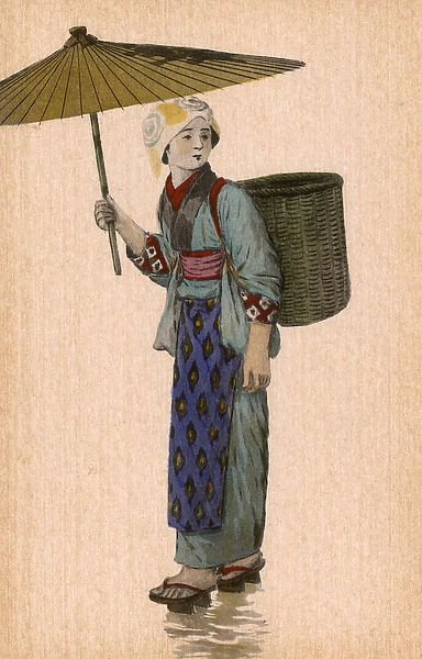 Japan - Japanese woman with umbrella and basket backpack