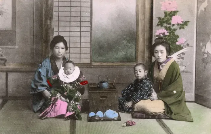 Framed Print : Japan - Japanese Women pose for a photograph with babies Framed Print : Japan - Japanese Women pose for a photograph with babies