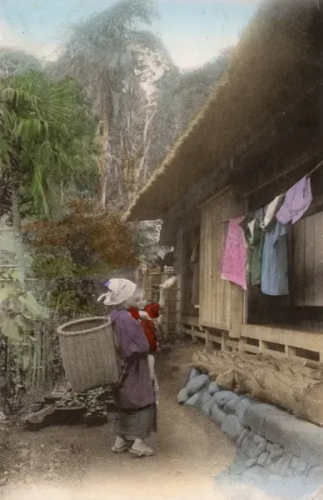 Framed Print : Japan - Mother and young child outside wooden home Framed Print : Japan - Mother and young child outside wooden home