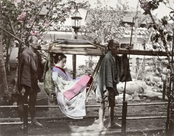 Framed Print : Japan - woman with porters in a kago or carrying chair