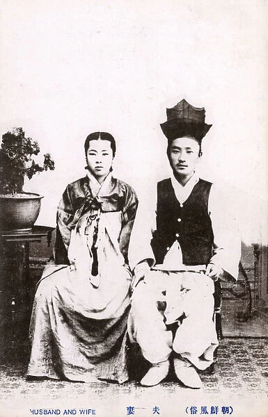 Japanese Couple pose for a formal photograph