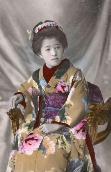 Japanese Geisha - Seated in an ornately-carved chair