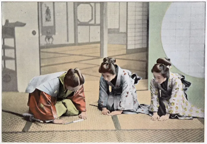 Framed Print : A Japanese lady welcomes two visitors into her home Date: 1890S Framed Print : A Japanese lady welcomes two visitors into her home Date: 1890S