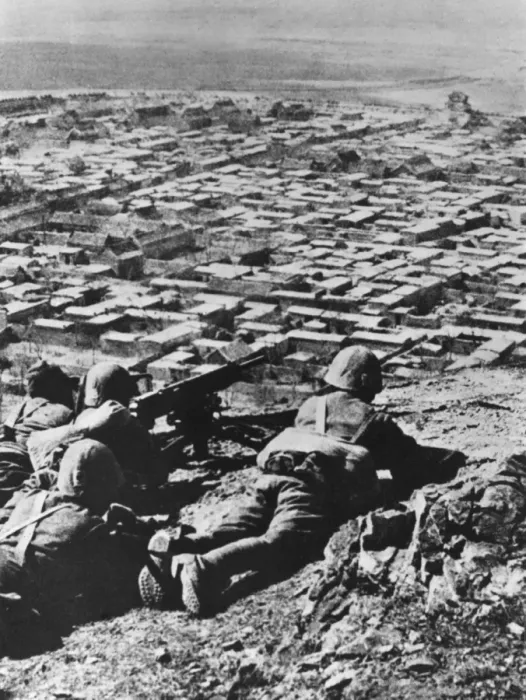 Framed Print : Japanese machine gunners overlook town Framed Print : Japanese machine gunners overlook town